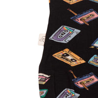 Macacão de Bebê com Zíper Estampa Fita Cassete Preta – Estilo Retrô e Conforto | Trend4kids